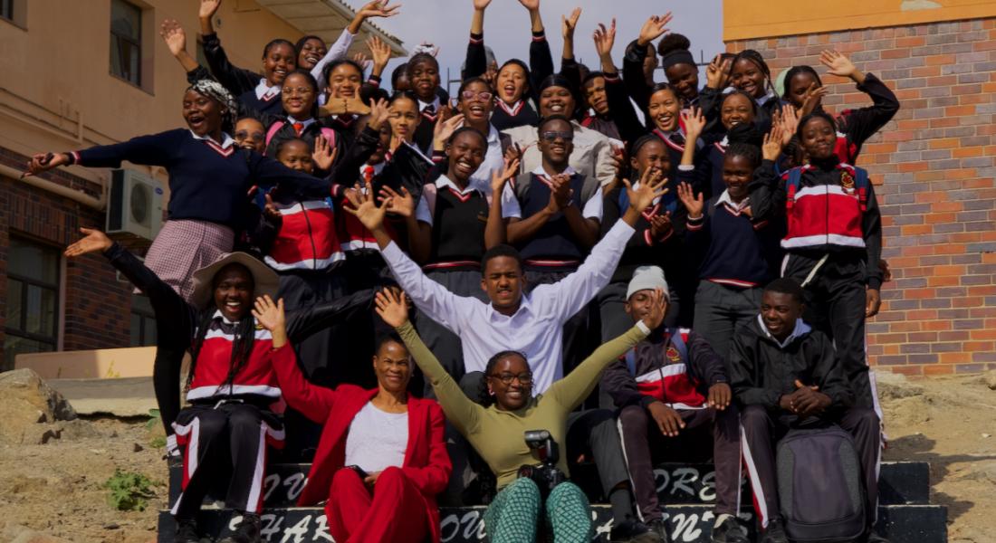 Group photo with learners from APSS